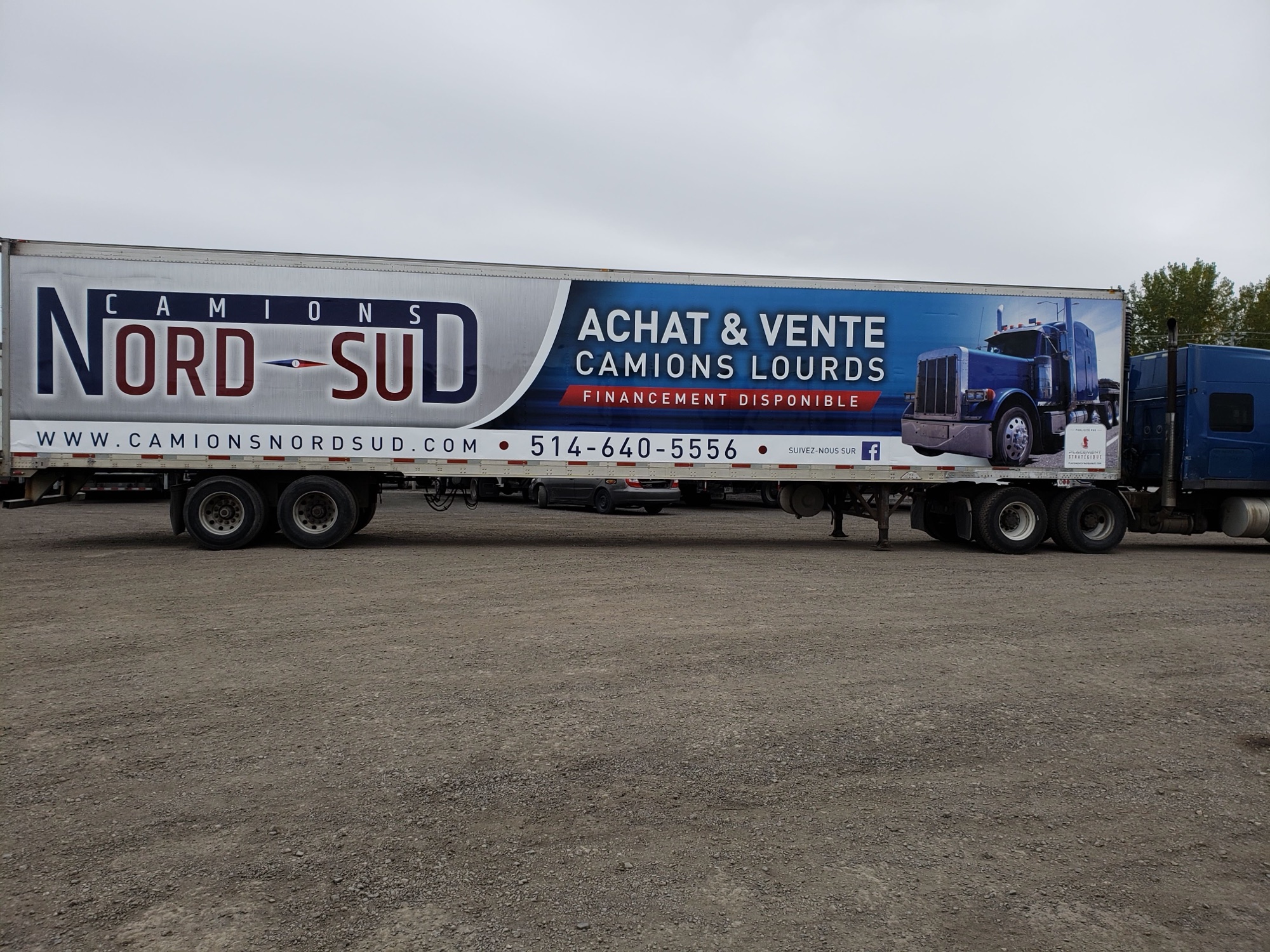 Full side of the 53-ft trailer with the Camions Nord Sud advertisement